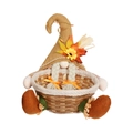 Close-up of autumn gnome basket with maple leaf decor and woven candy storage base - Female (Braids)