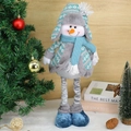 Ausziehbare Schneemann-Weihnachtsfigur in blauem Strickpullover vor festlichem Hintergrund - Schneemann-Stil