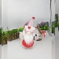 Detail of Valentines gnome plush with red sequin hearts and knitted pattern hat - Small Envelope Style