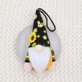 Detail of bee gnome ornament with sunflower accents and knitted hat on heart tray - Black And Yellow Polka Dot Style (0427)