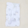 Close-up of white plush Christmas wine bottle cover with silver snowflakes and bow - Silver Style