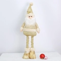 Detail van de kerstman pluche met gouden lovertjes, uitschuifbare benen en wit imitatiebont - Kerstman