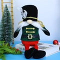 Detail of Nutcracker gnome plush with gold sequins and long beard on festive background - Sitting Cyan Soldier