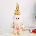 Detail der Weihnachts-Weihnachtsmann-Puppe mit Pailletten-Strickmütze und Skizubehör - Weihnachtsmann