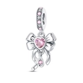 Close-up of bow charm with pink heart gemstone and sparkling stones on silver band - Sweet Bow Pendant (PAC1198)