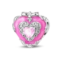 Macro view of heart-shaped charm with pink enamel and center crystal bow detail - Baroque Vintage Heart Bead (PAC1578)