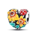 Macro view of sunflower bead charm with red ladybug and enamel leaf details - Sunflower Heart Ladybug Bead