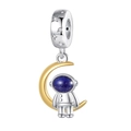 Macro detail of astronaut and golden moon charm with blue starry sky visual features - Galaxy Spaceman Charm (PAC431)