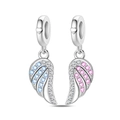 Detailed close-up of silver angel wing charms with blue and pink cubic zirconia inlays - Couple Wings Charm (PAC1781)