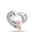Detailed view of hollow heart charm with I Love You engraving and rose gold ring - Two-Tone Hollow Heart Ring Style (PAC895)