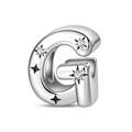 Detailed macro view of letter G silver charm bead with sparkling cubic zirconia inlay - Letter G