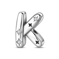 Close-up of silver letter K charm with white zirconias and star details for DIY jewelry - Letter K