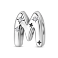 Close-up of silver letter M charm bead with sparkling zircons and black star motifs - Letter M