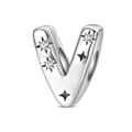 Close-up of silver letter V charm with zircon stars and black enamel detailing - Letter V
