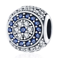 Detailed view of silver-plated evil eye charm with blue and white zircon micro-pave setting - Round Concentric Charm (PAC1049)