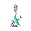 Macro detail of bird charm with green enamel and purple flower for DIY bracelets - Swallow Delivering Spring Pendant