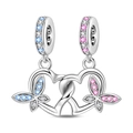 Close-up of interlocking heart charm with pink and blue zircons and wing details - Lover Butterfly Interlocking Heart Charm (PAC1784)