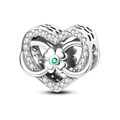 Macro shot of silver heart charm with green clover gemstone and sparkling zircons - Heart Infinity Clover Style (KTC705)