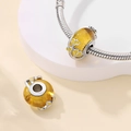 Silver snake chain bracelet with yellow glass charms and ginkgo leaf filigree - Vintage Ginkgo Glass Bead