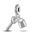 Detailed view of silver heart lock and key charm with sparkling crystal pavé setting - Heart Lock And Key Dangle Charm (W-PAC599)