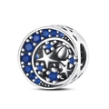 Detailed view of silver crescent moon charm with blue sapphire stones and center star - Ocean Shell Charm (PAC439)