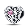 Macro view of heart-shaped hollow charm with pink zircon and intricate vine patterns - Heart Tree of Life Bead (PAC819)