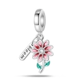 Detailed close-up of silver flower charm with pink enamel and bloom engraved tag - Pink Daisy Bloom Pendant (PAC901)