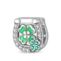 Macro detail of silver horseshoe and green clover charm with sparkling zircon inlay - Double Lucky Clover