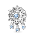Macro shot of silver snowflake charm with blue gemstones and star pendants for jewelry - Ice Flower Stone