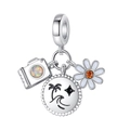 Macro shot of silver charms with colorful camera, palm tree coin, and white daisy - Travel Camera Flower Charm (PAC464)