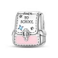 Macro view of school backpack charm with Back to School engraving and pink enamel detail - Pink School Bag Style (PAC1813)