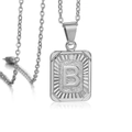 18K white gold plated rectangular pendant necklace featuring letter B with sunburst frame - Initial B / Steel