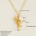 Golden stainless steel cupid wings necklace with a 9x7mm freshwater pearl and bead chain - Cupid