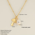 Gold stainless steel necklace featuring a mushroom pendant and a white freshwater pearl - Mushroom