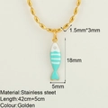 Gold stainless steel necklace featuring a colorful striped fish pendant with bead chain - Light Green Fish