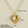 Golden heart pendant necklace with pearl and snake relief in hammered stainless steel - Heart Snake