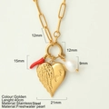 Gold angel heart pendant necklace with feather details, red chili charm and pearl - Heart Wings