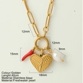 Collana dorata in acciaio inox con cuore d'angelo, peperoncino e perla d'acqua dolce - Rilievo di Ala di Cuore