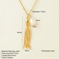 Collana con ciondolo a polpo dorato con perla d'acqua dolce e catena in acciaio al titanio - Stile Calamaro (1857)