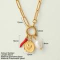 Collana in acciaio dorato con peperoncino rosso, cuore e perla d'acqua dolce - Cuore Rotondo