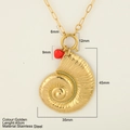 Gold stainless steel shell pendant necklace with a small red heart charm and long chain - Conch