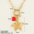 Gold stainless steel starfish necklace with a red heart pendant and spring clasp - Starfish (1861-G)