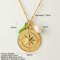 Golden stainless steel necklace with compass pendant, green chili charm, and pearl - Chili Compass Style