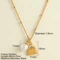 Collier en acier inoxydable doré avec perle blanche et pendentif sac à main - Pendentif Sac à Main (25167)