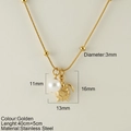 Gold stainless steel necklace featuring a sea turtle pendant and round white pearl charm - Turtle (25209G)