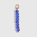 French vintage style pendant with faceted blue beads and a golden metal ring - March - Light Blue