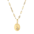 Golden paperclip chain necklace featuring an oval pendant with letter U and starburst - Letter-U