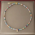 Bohemian colorful beaded stainless steel necklace with golden heart pendant detail - White Heart