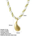 Handwoven cord necklace with a polished gold teardrop pendant in stainless steel - Water Drop