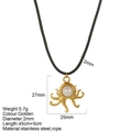 Collar de pulpo dorado en acero inoxidable con perla, cordón negro y medidas del dije - Estilo Pulpo